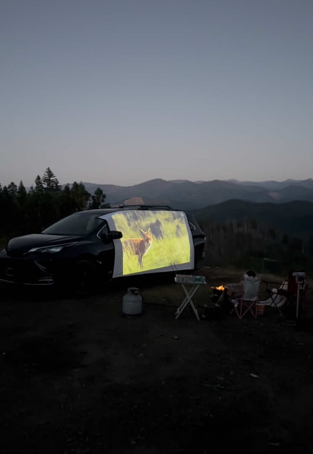 A post by @dadsocial on TikTok caption: A lot more goes into a simple movie night like this than most people think, but @AT&T makes it a lot easier with their Connected Car™ WiFi! Helping us connect our projects to our phones and stream movies wherever we are! Click the link to receive a free trial of AT&T's Connected Car™! #ATTInfluencer 