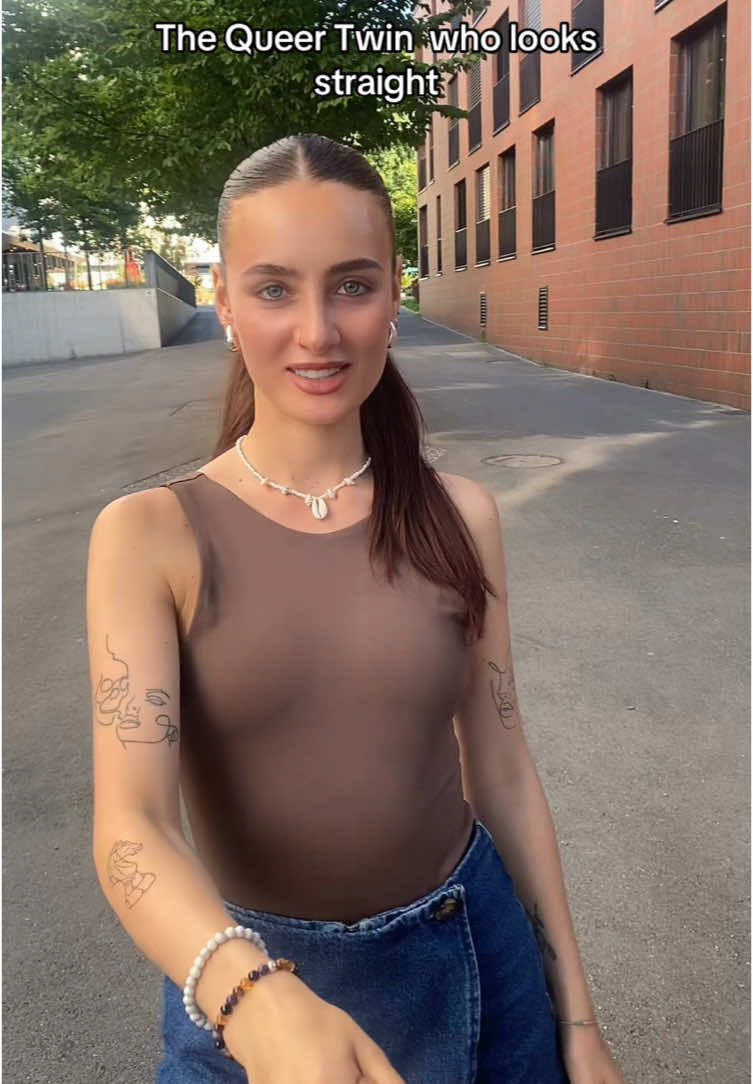 A post by @ on TikTok caption: #twins#wlw#ilegal#pink#sisters @zoe baumann  ☀️🌙