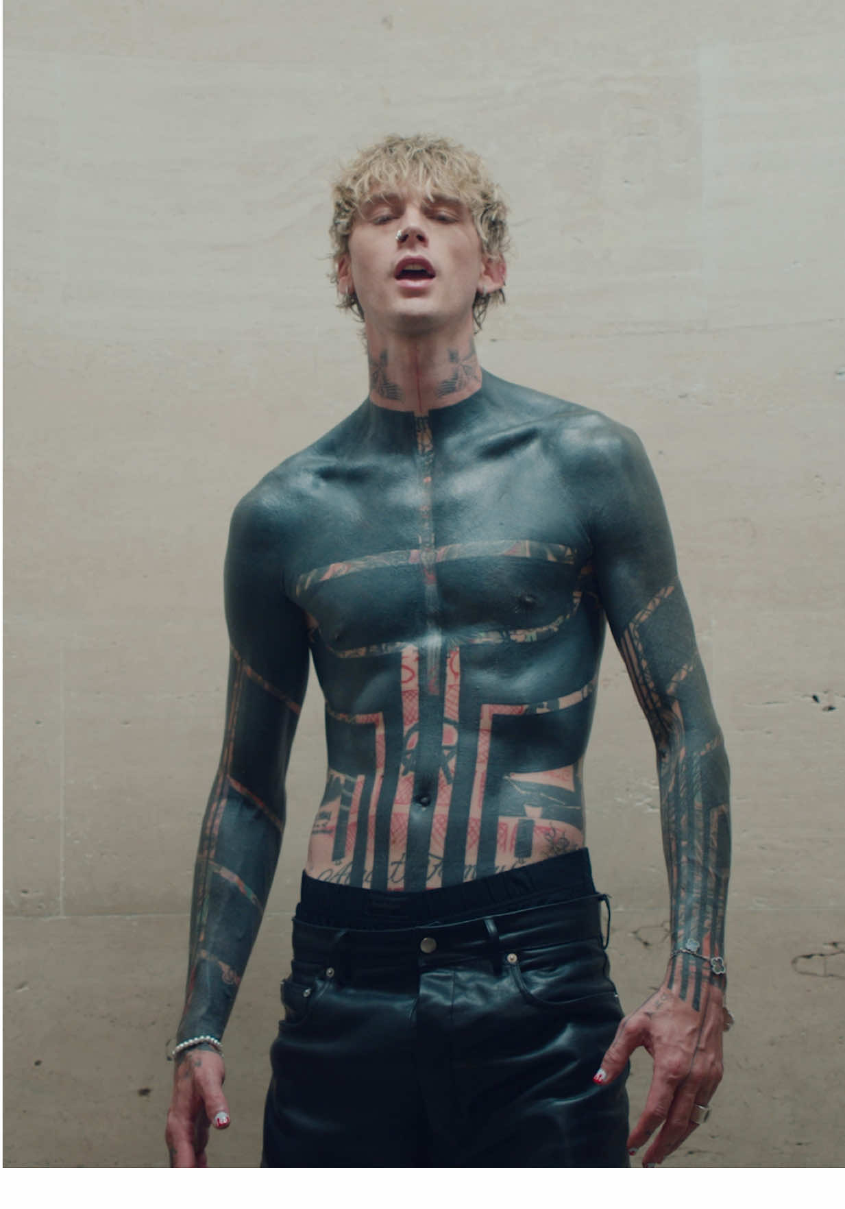 A post by @mgk on TikTok caption: “vampire diaries” out tonight. video tomorrow 12pm EST. lost americana album season 🚬 #newmusic 
