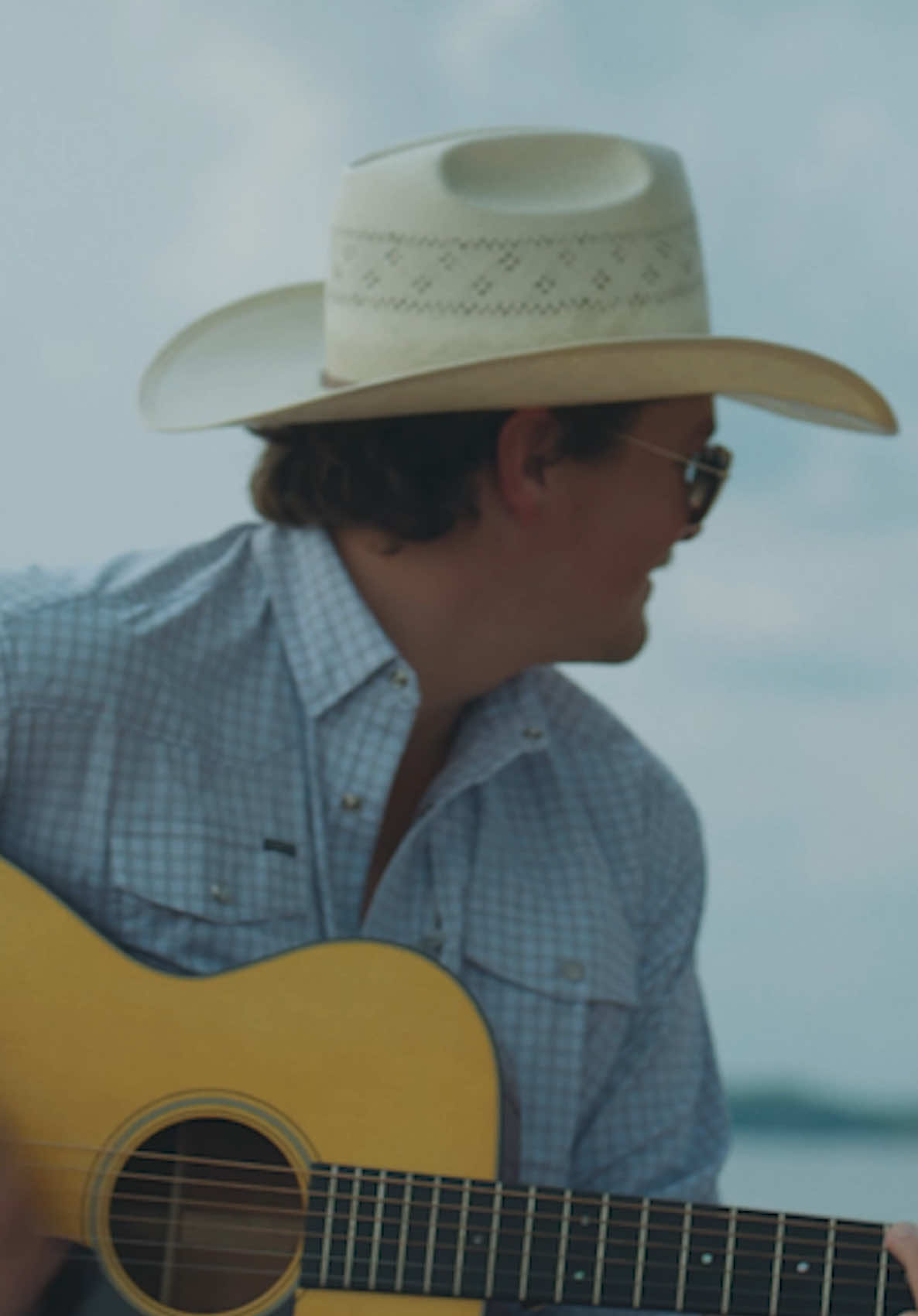 A post by @zachtop on TikTok caption: You’ve never seen a more cringeworthy air guitar solo  #classiccountry #countrymusic 