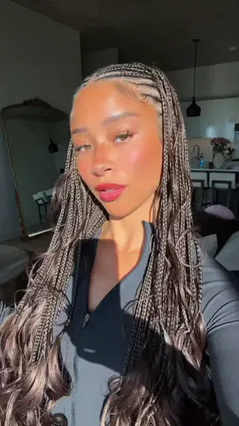 A post by @lexielearmann on TikTok caption: THESE SNAPPED @Amorology 🤍 💓🤏🏽 I’m obsessed!!! #fyp #hair #braids #fulanibraids #knotlessbraids #curlyhair #transition #viral 