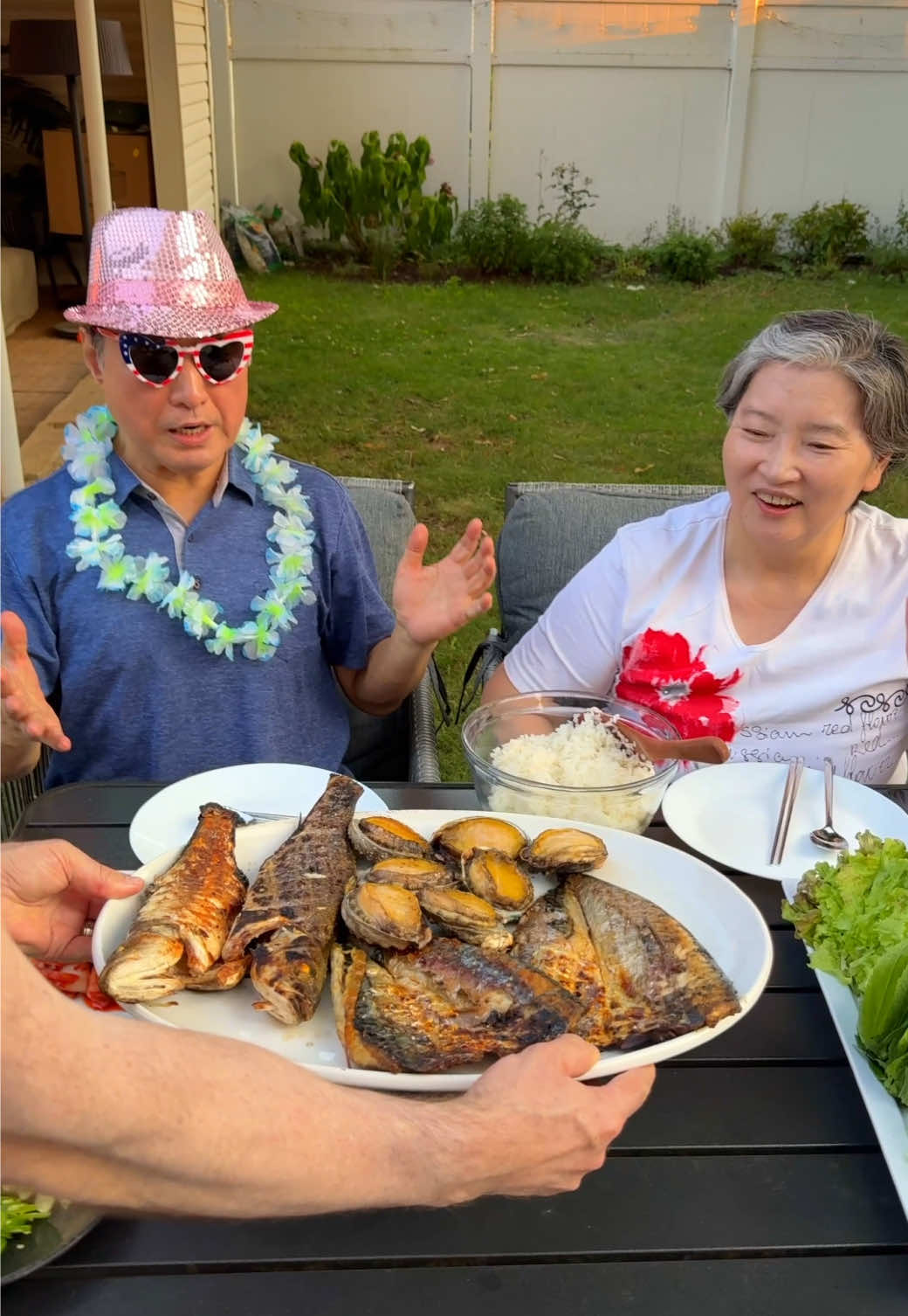 A post by @crazykoreancooking on TikTok caption: We grilled Spanish mackerel, Bronzino, Mackerel, Hairtail from Jeju Isaland in Korea and Abalones for the 4th of July weekend. Mom made her special dipping sauce which really elevated the fish. Sister made doenjang jjigae. Grilled abalones were so good. (I’ve only tried raw or steamed and grilled ones were even better.) So grateful to be able to enjoy the weekend with the family and good food. #bbq #grilling #mukbang #foodreview #koreanfood #kdrama