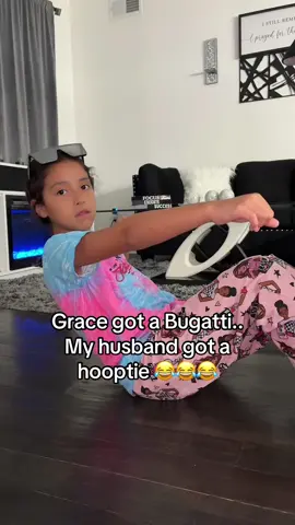 A post by @boss_lady4real88 on TikTok caption: At this point he hates me 😂😂😂 he thought he was going to go fast 😂😂😂😂 #fyp #trending #funny #bugatti 