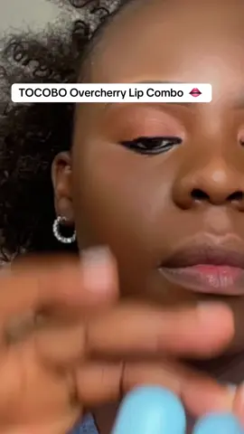 A post by @auntiebougie on TikTok caption: That “just-bitten” lip look is trending and TOCOBO understood the assignment. These tints melt into your lips and leave a gorgeous stain. #BerryLipTrend #JuicyLips #CapCut 