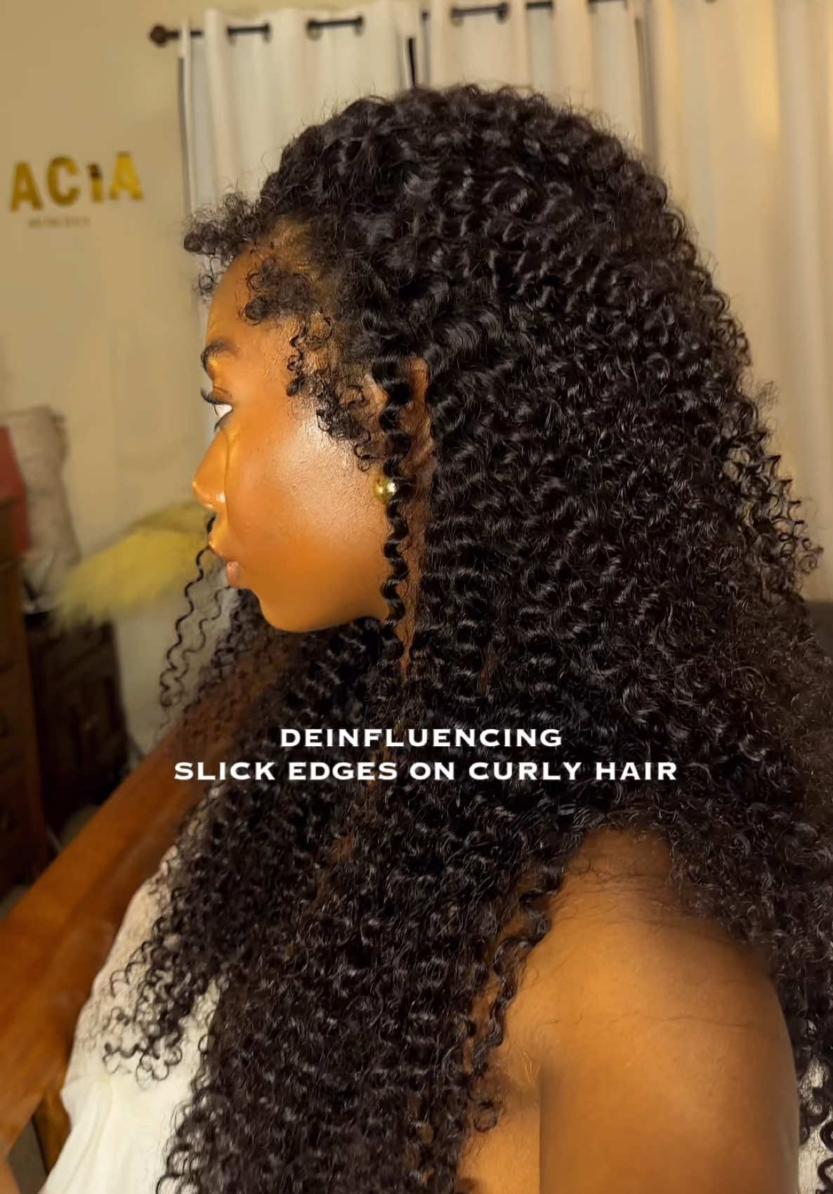 A post by @daciapetrie on TikTok caption: Curly edges just makes more sense ft @SIMIDOLA_HAIR 