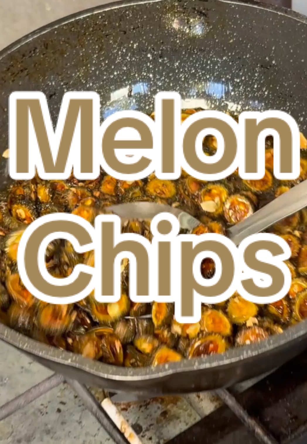 A post by @parmskitchen on TikTok caption: Karele Chips 🫶 Too easy to make!  Heat up mustard oil, drop in chopped Karele slices, add salt towards the end. Add some love, Drain the oil and enjoy ☺️ 