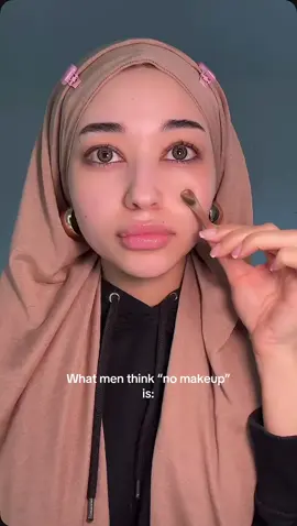 A post by @by.imanx on TikTok caption: What men think “no makeup” is 🙈 #makeup  Products used: @Caudalie vinoperfect serum @DanessaMyricksBeauty yummy skin blurring balm powder @COVERGIRL clean fresh brow nano brow pencil @got2b 2 in 1 brow & edge gel @Diorbeauty forever skin contour stick @Hourglass Cosmetics vanish concealer and ambient strobe lighting powder @Benefit Cosmetics benetint  @LottieLondon freckle tint @Huda Beauty lip contour stain  @YSL Beauty I loveshine candy glaze