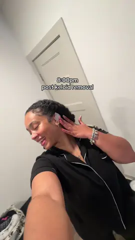 A post by @butttttttttah on TikTok caption: I was THIRSTY to try this trend 😂 listen, I’m proud about this damn keloid surgery and when it heals… I swear yall gone see this ear 🤝🏽😂 Let me rock out for a little lol.  #latto #keloid #keloidremoval #keloids #skin #skintag #fyp #dermatologist #cheabuttah 
