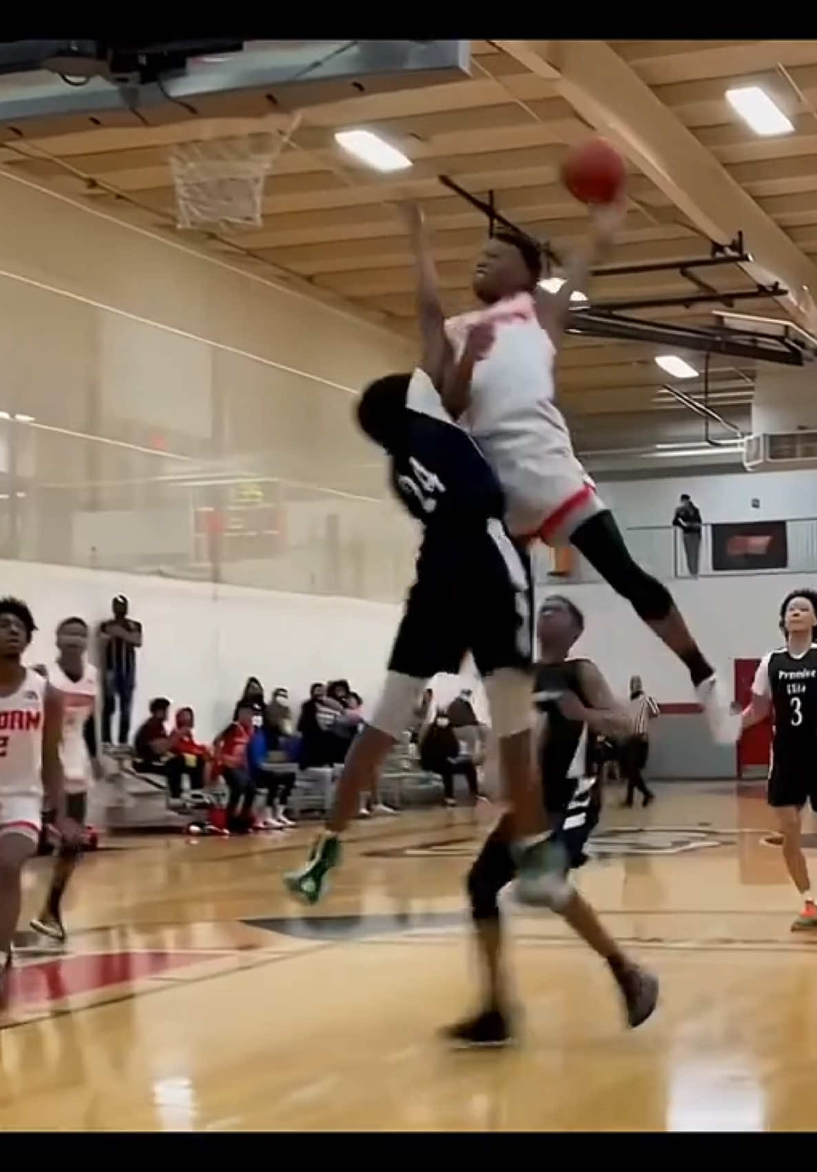 A post by @dunk on TikTok caption: Most Disrespectful HS Dunks 😤 (@Add1media) #nba #basketball #sports #fyp 