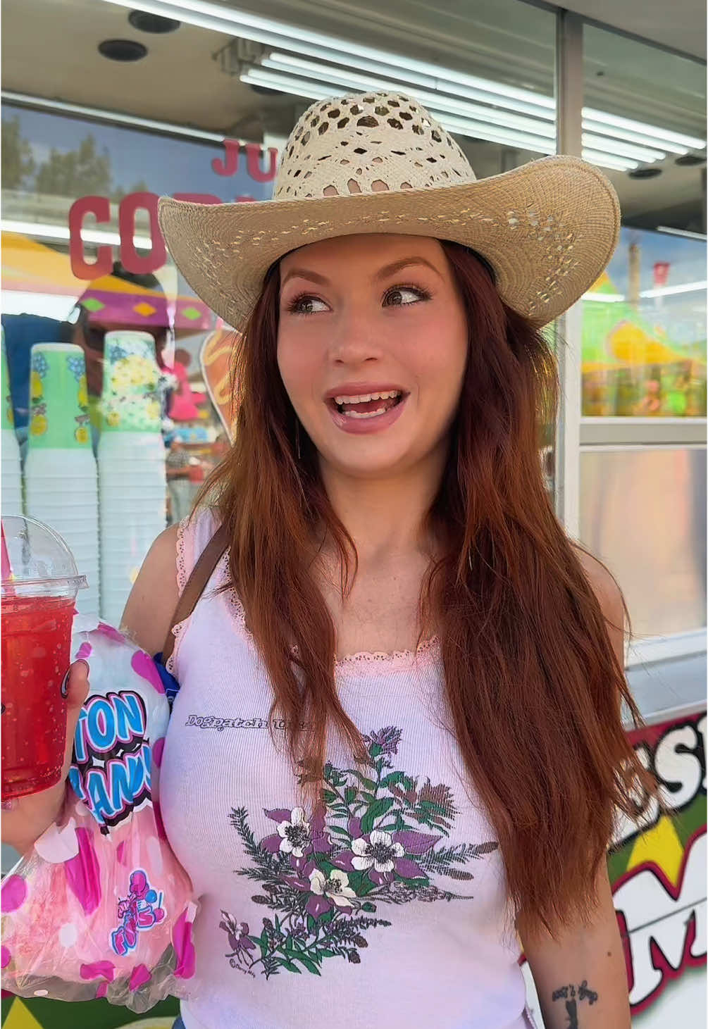 A post by @willowavalon on TikTok caption: Calgaryyyyyyystampeeeeeed doin me right yall #country #calgarystampede #festival #fair #statefair #reba #corndog #funny 