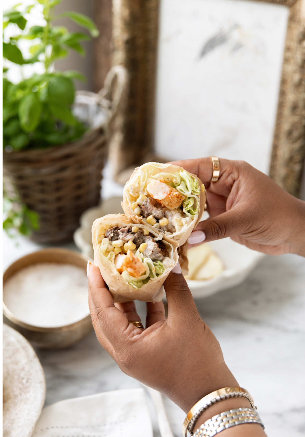 A post by @nabela on TikTok caption: Officially my favorite thing I’ve ever made. Save it. Make it. You will love every crunchy bite. 😋  A Surf & Turf Lettuce Wrap, packed with protein + flavor, by yours truly. 🫶🏽 #pocketsofpeace #nabelanoorhome #foodtiktok #recipe #homemade #easyrecipe #quickrecipes #diy #fypシ 
