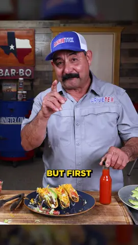A post by @arnietex on TikTok caption: A perfect crispy taco bite requires hot sauce