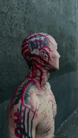 A post by @scm_ink on TikTok caption: What does his family think👀#fyp #foryoupage #tattooartist #tatted #tattoos #tattooideas #viral #backtattoo #facetattoo