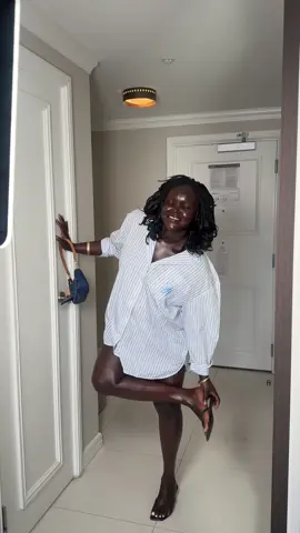 A post by @dollievision on TikTok caption: Grwm ootd showing you my outfit for today for laid back  Top: @Tommy Hilfiger #gifted  Heels: @H&M  Purse:@Coach  #fyp #nyadollie #grwm #beauty #OOTD 