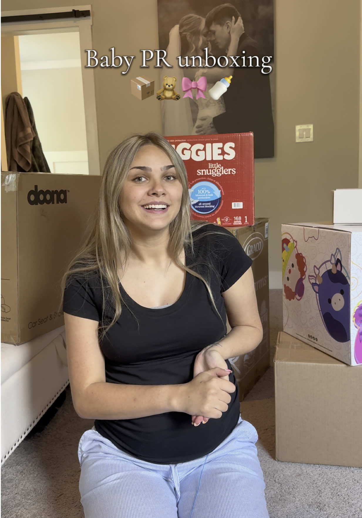 A post by @arianalee99 on TikTok caption: Baby PR haul 📦🍼🧸 @kytebaby @Squishmallows @Wildbird @Huggies® @Doona #pr #prhaul #unboxing #unbox #babyhaul #babyclothes #MomsofTikTok 