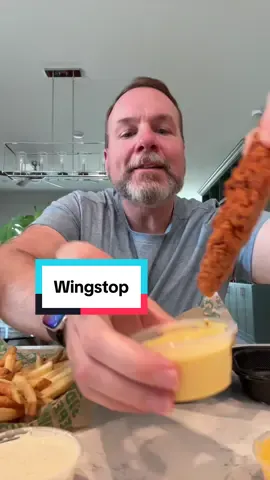 A post by @anidaslajaunie on TikTok caption: @Wingstop gets five stars tonight. #wingstop #chickentenders #mukbang #eatwithme 