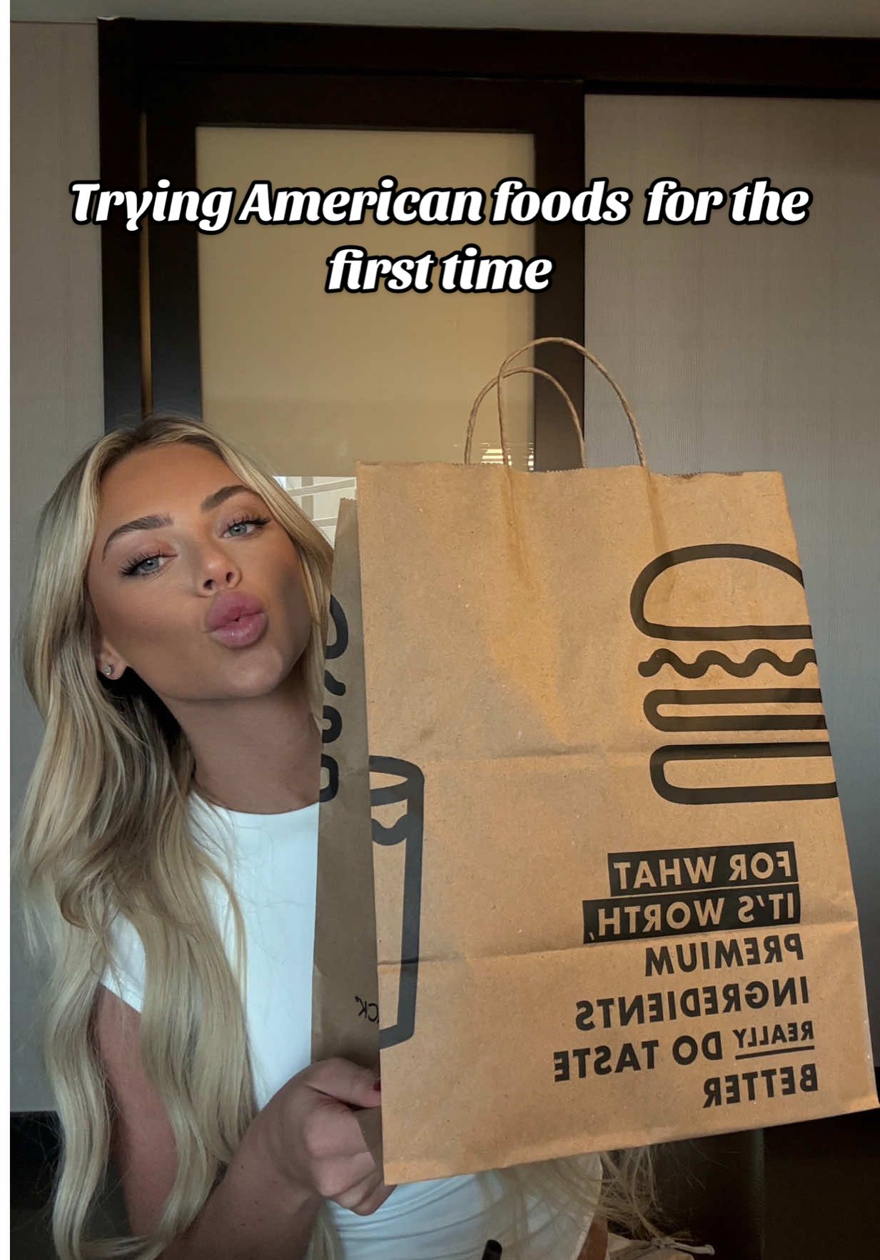 A post by @ on TikTok caption: trying shake shack for the first time #shakeshack #americanfood #tryingfood 