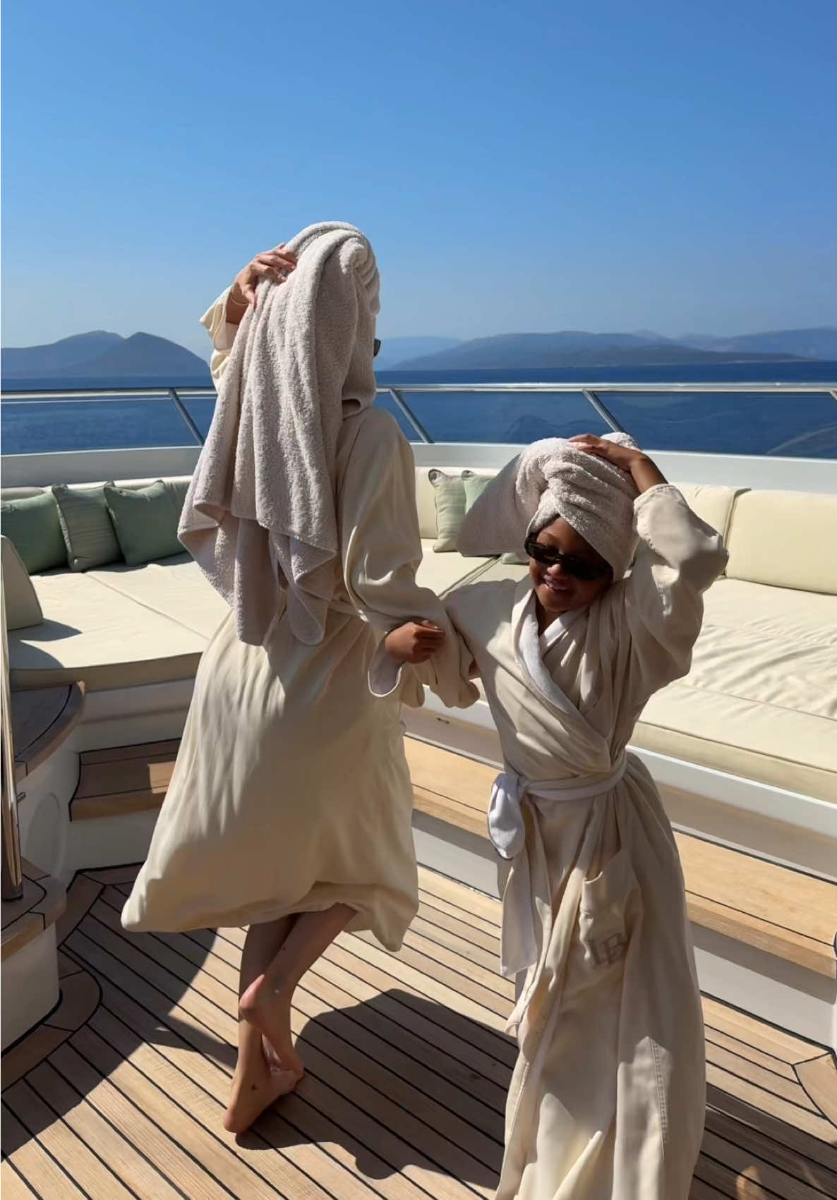 A post by @kyliejenner on TikTok caption: can’t see our haters from here 