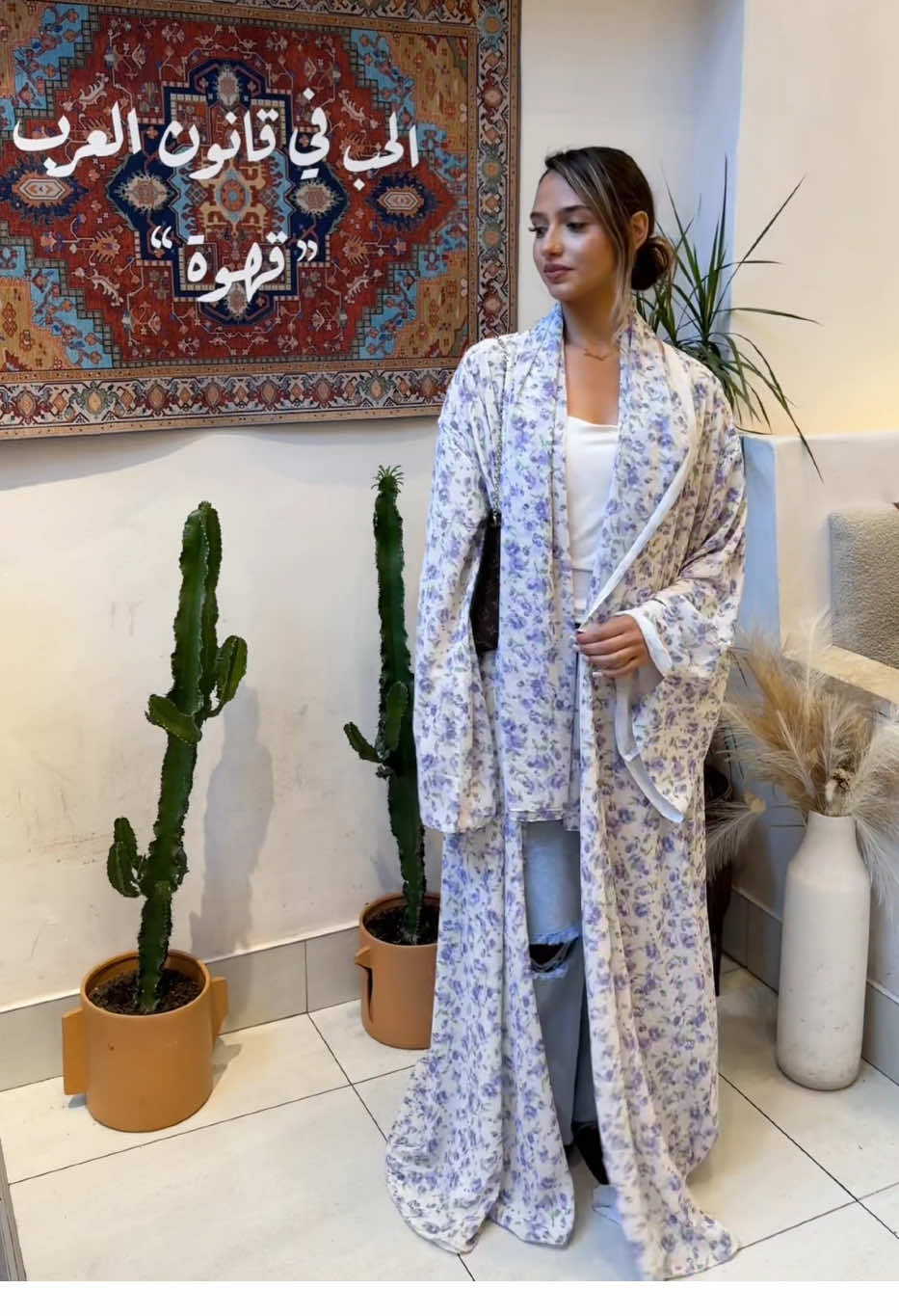 A post by @arra.collective on TikTok caption: Shop our limited edition overcoat! Only a few left 💜.                                           #fy #foryou #foryoupage #abaya #abayagirls #OOTD #ootdhijab #hijab #modestoutfits #fyp