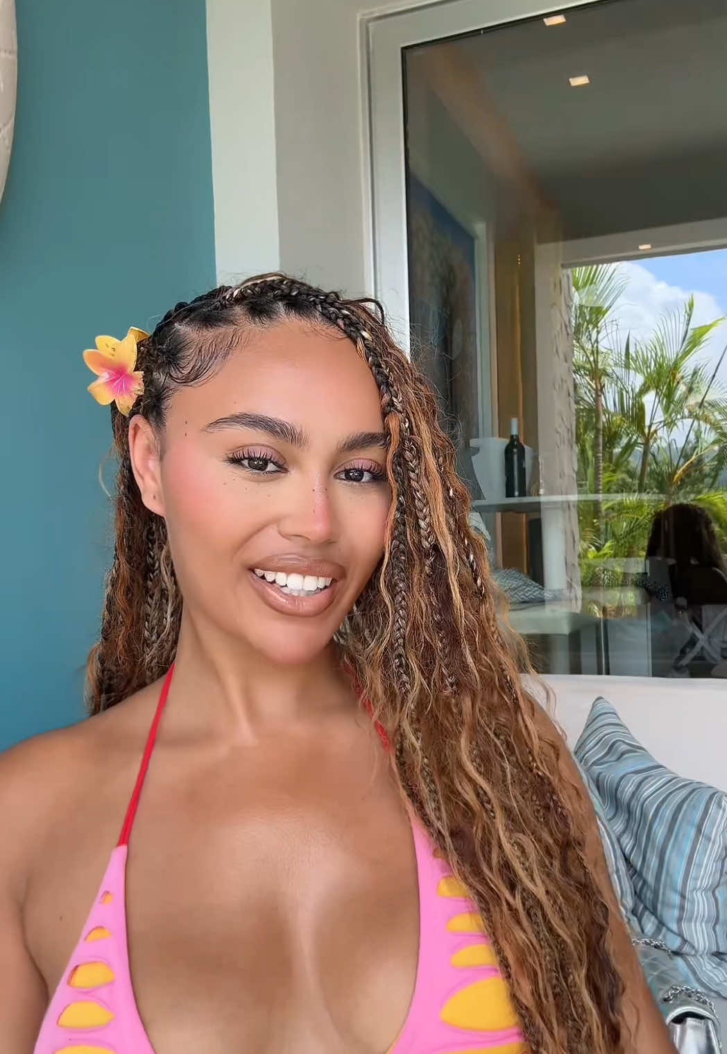 A post by @3llathomas on TikTok caption: GRWM in Jamaica 💗👙natural makeup