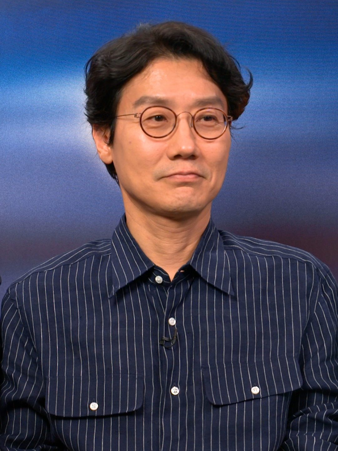 A post by @squidgamenetflix on TikTok caption: Director Hwang Dong-hyuk talks through the fate of the baby in this exclusive post season 3 interview. #SquidGame @kierapleaze #PhilYu 🎧 Listen to more from Squid Game: The Official Podcast.