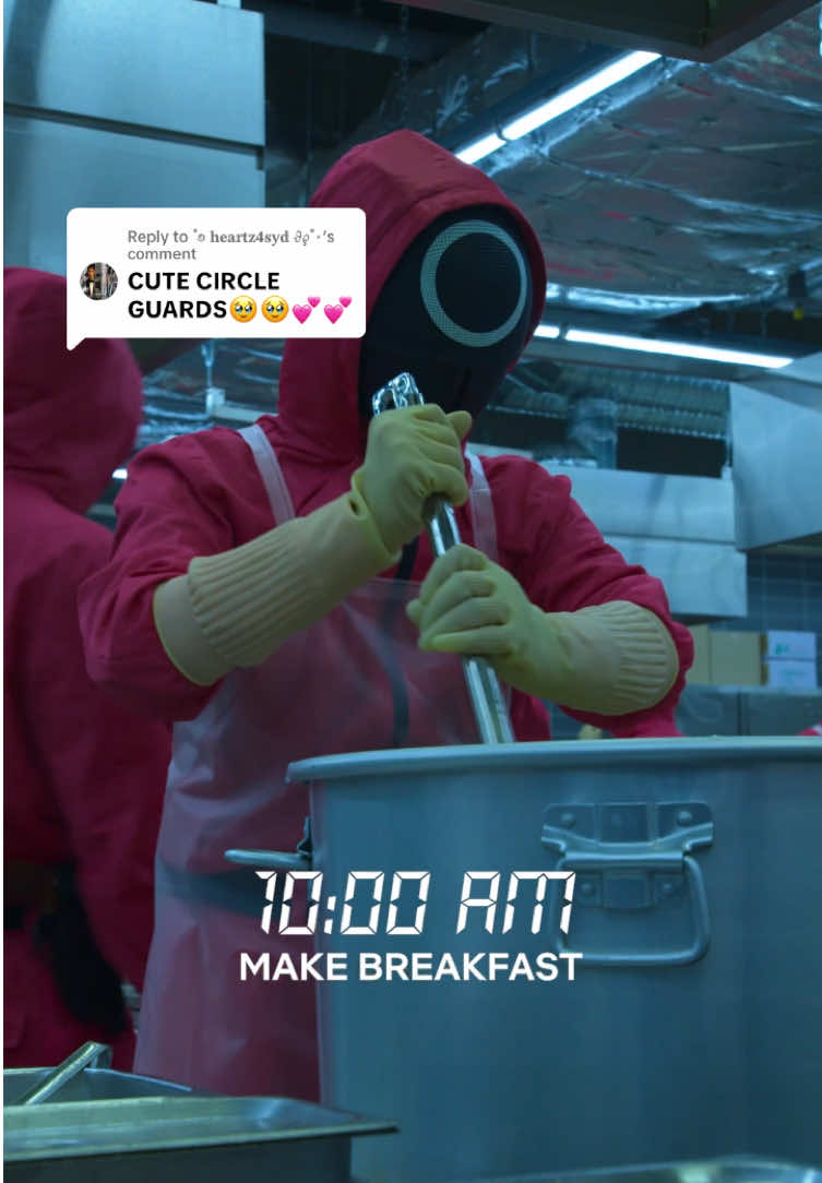 A post by @squidgamenetflix on TikTok caption: Replying to @˚࿔ 𝐡𝐞𝐚𝐫𝐭𝐳𝟒𝐬𝐲𝐝 𝜗𝜚˚⋆ just another day for our circle pink guard 🎀 #SquidGame #PinkGuard