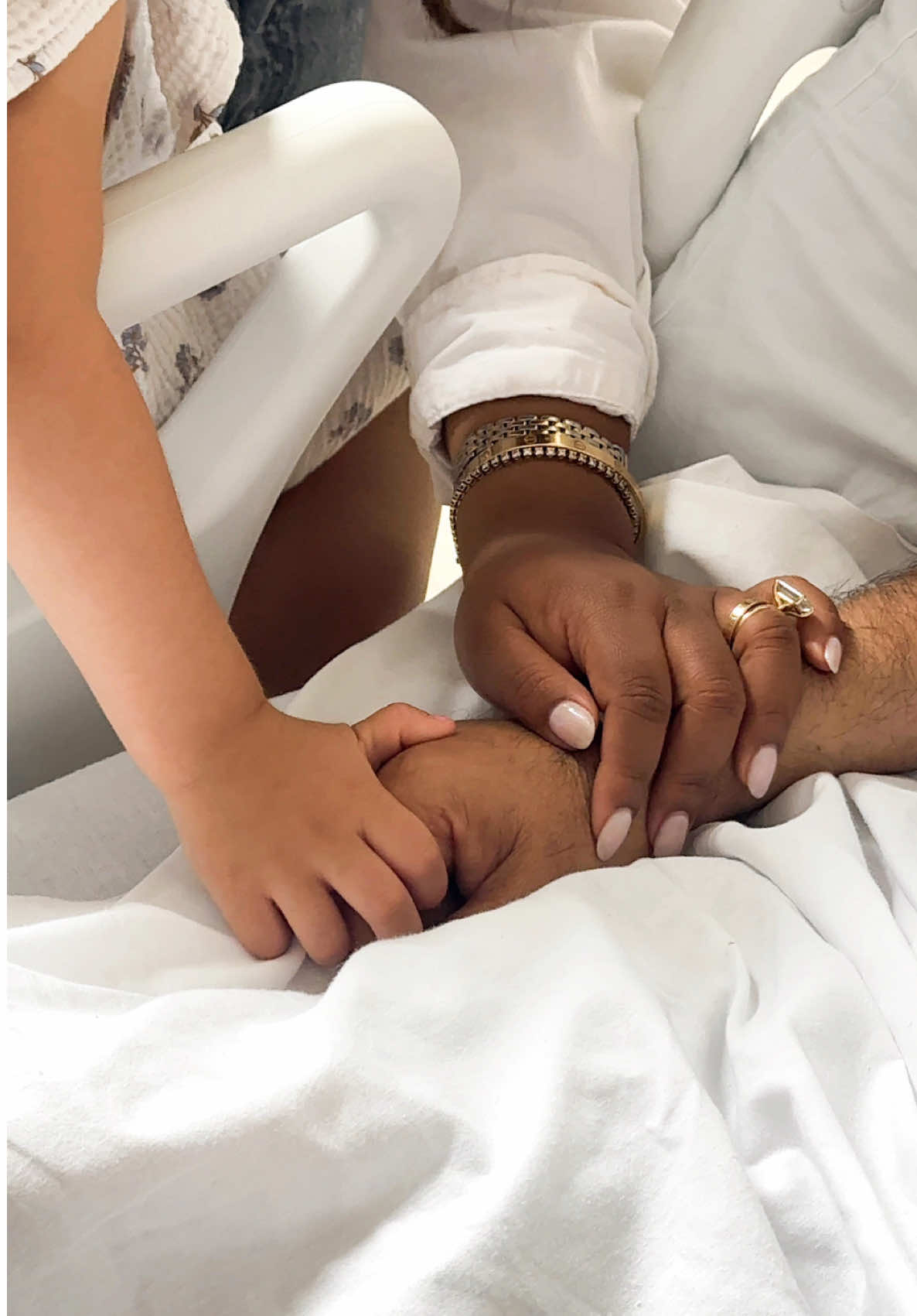 A post by @nabela on TikTok caption: When I was struggling with infertility, my dad prayed for these girls with everything he had. Now they’re here, our little miracles, praying for their Nana Bhai as he navigates the hardest week in the hospital.  It feels like life has come full circle, and even in this hard moment as a family, we’re holding on to hope. We believe in answered prayers, because we’ve seen them before. 🤍 #infertility #prayer #family #grandparents 