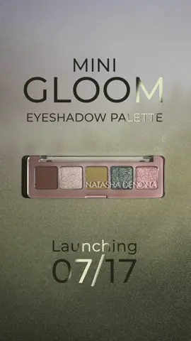 A post by @natashadenona on TikTok caption: Introducing my NEW MINI GLOOM EYESHADOW PALETTE ☁️ This COOL-TONED 5-pan fall essential brings rich mossy hues to life!!!!! Featuring cool-toned olive greens with shimmering pops of taupe and rose, each shade is crafted in my iconic MATTE, METALLIC and SPARKLING formulas for chic neutral to sophisticated sparkling green looks with a pop of color 🤤 Inspired by autumn’s earthy tones, this edgy yet ethereal travel-friendly palette delivers seamless blendability, vibrant and ultra-pigmented results!!!!!!! Chic and gloomy vibes for all our sophisticated eye look dreams for every skill level 💫 Shade Description: Cinder 630CM - Matte Dark Dusty Olive Taupe  Zephyr 631M - Metallic Light Taupe Champagne  Moss 632CM - Matte Medium Muted Olive Verdant 633M - Sparkling Metallic Dusty Petroleum Green Glint 634M - Metallic Light-Medium Dusty Rose ☁️ MINI GLOOM EYESHADOW PALETTE - $27☁️ LAUNCHING JULY 17th at www.natashadenona.com US EXCLUSIVE @Ulta Beauty + ALL SEPHORA EU ✨ Check out my highlights for your favorite ND resellers globally ✨ #explore #natashadenona #minigloompalette