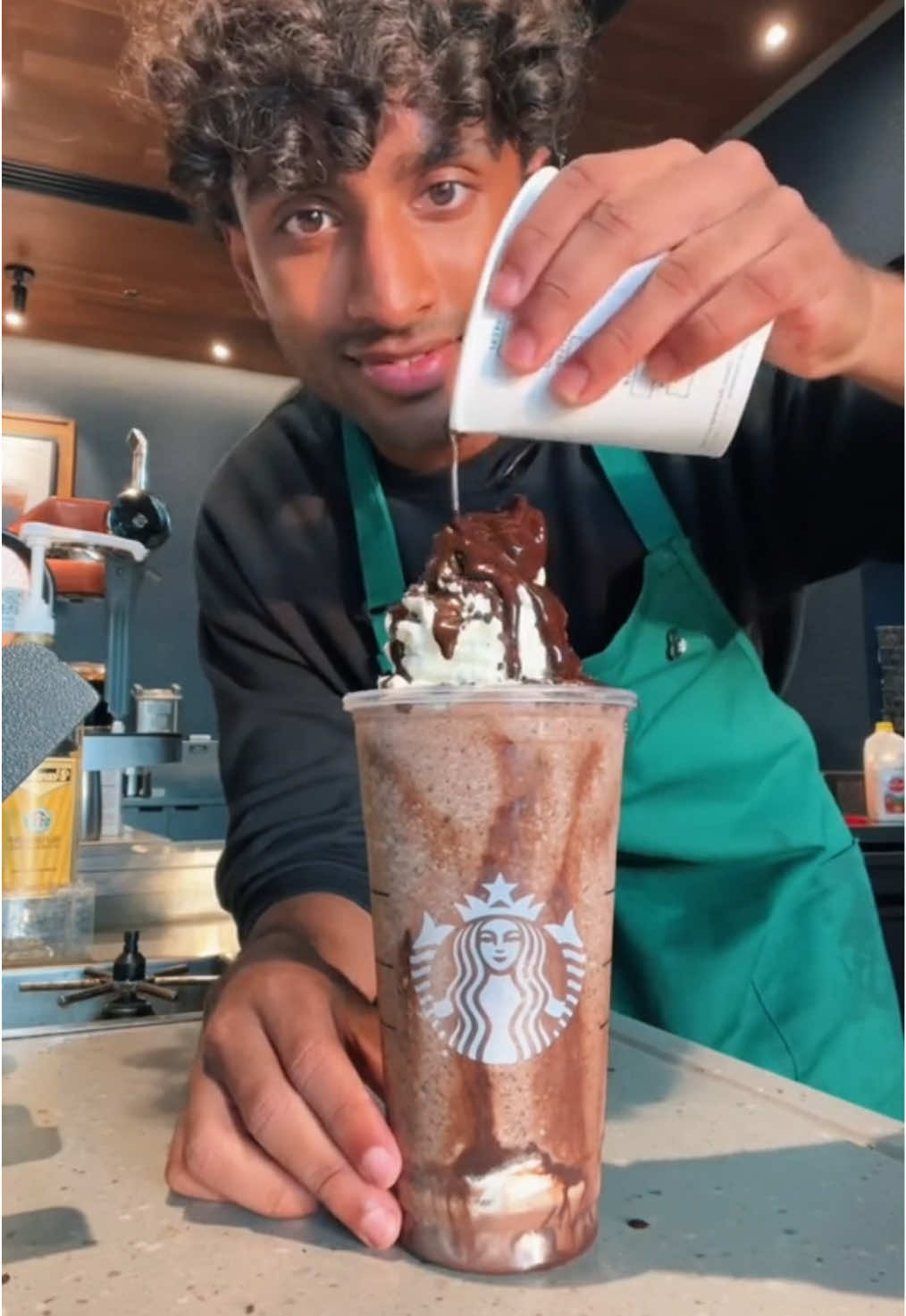 A post by @itsjoboi on TikTok caption: Chocolate Cookie Frappuccino is a W menu drink🔥 #fyp #Viral #trend #starbucks #indian #barista #brown 