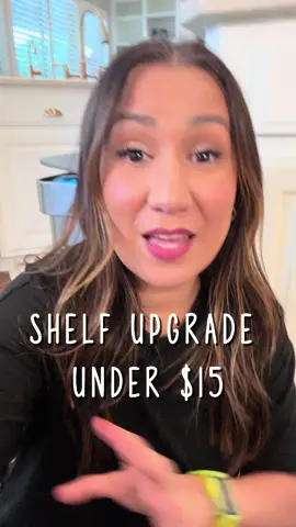 A post by @organizingspacesbykim on TikTok caption: You can always get a custom shelf installed but for a fraction of the price you can add these cabinet shelves. Only $13 per shelf — and the return? Exceptional! You get MORE storage! 🙌🏽 #dallasprofessionalorganizer #rockwallprofessionalorganizer #dallasorganizer #rockwallorganizer #unpackandorganize #movingspecialist #dallasmoving #dallasmovingservices #dallasmovingexperts 