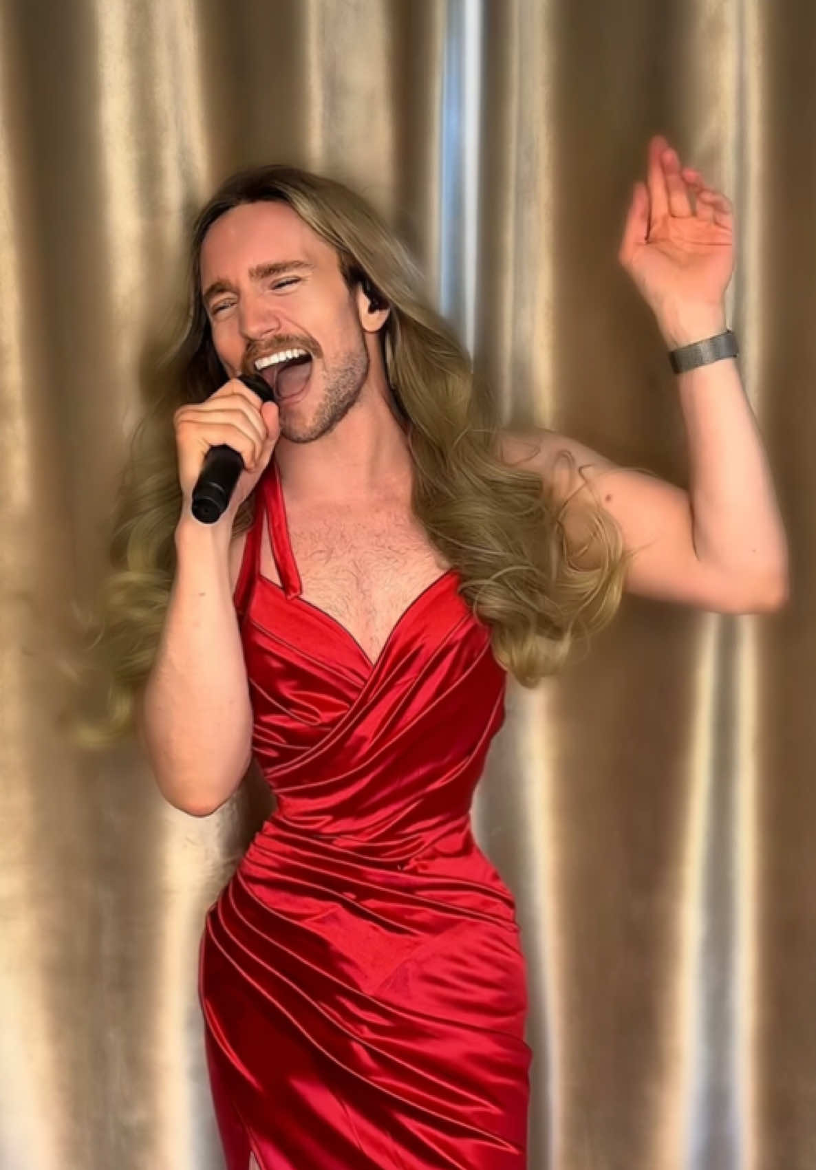 A post by @nicholas_flannery on TikTok caption: I mean who’s excited for mc16 though? I’m just having a little fun here but LORD there were technically difficulties from the wig flying into my eyes to strange looks from the gardener. Yes sir, I gotta do this.. this is work it takes a village (the village being the 39 personalities that exist in my head). Regardless this song always lifts me up to a higher power whenever I’m feeling a little defeated, many of her songs do but we all know this one takes us to CHURCH! #MariahCarey #typedangerous #beyonce #lipsyncbattle #taylorswifttour 