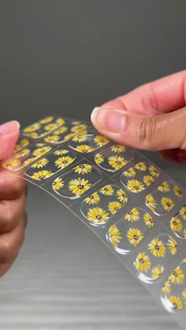 A post by @galorase on TikTok caption: Gel nail summer inspo 💐🌸 WE RESTOCKED!! 🌻🌻 Gel name: Sunflower Fields  #gelnailsathome #gelnails #summernails #gelnailsticker 