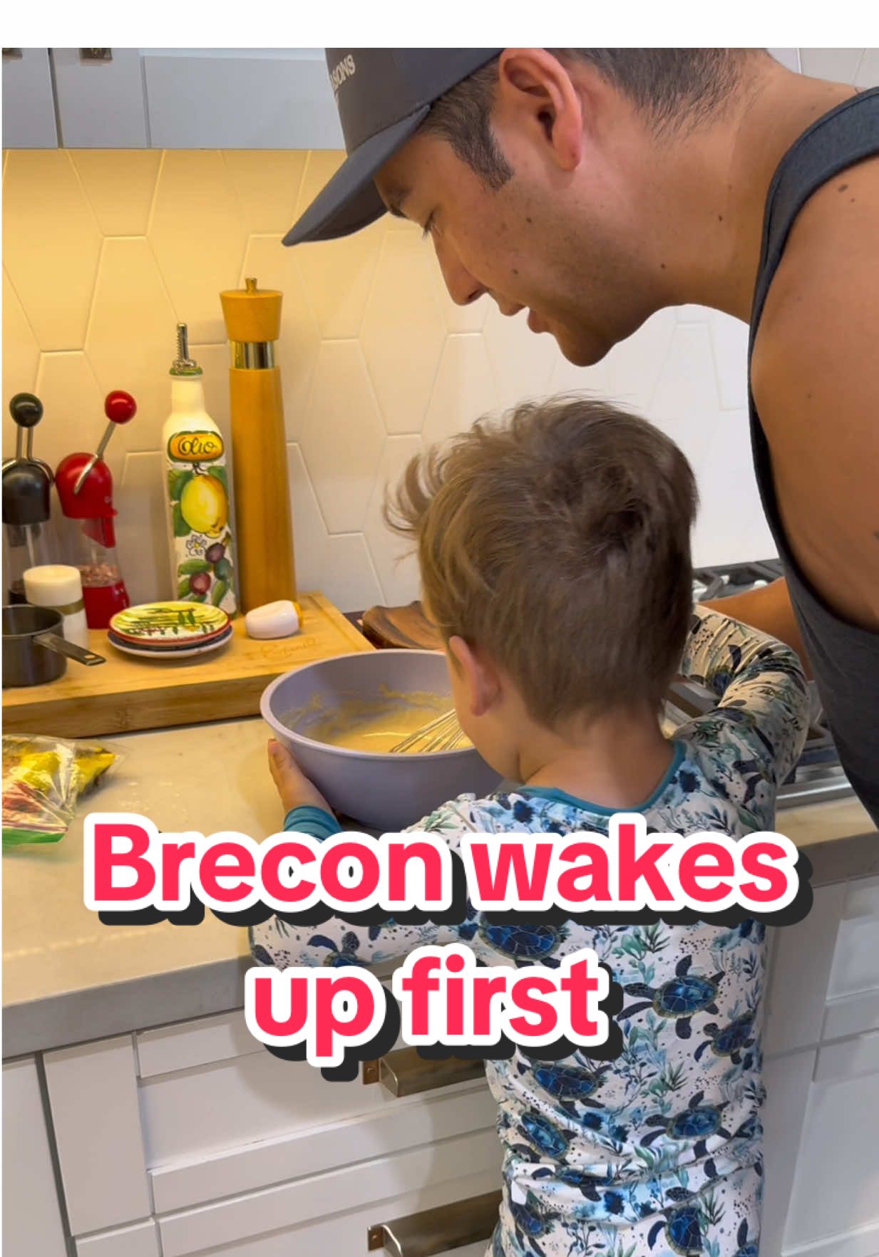 A post by @athomewithbryan on TikTok caption: If you’re new here, my daughter is our early riser while my son typically sleeps in. But over the last week or so, he’s been waking up before her. I smell another growth spurt! Since baby girl typically wakes up first, she’s usually the one to decide what’s for breakfast, but since she’s been extra sleepy, it’s time to give my son the same opportunity. Let’s see what he chooses! #breakfast #choices #positiveparenting #pancakes #littlehelper #bananas #dadsoftiktok #fatherhood #athomewithbryan 