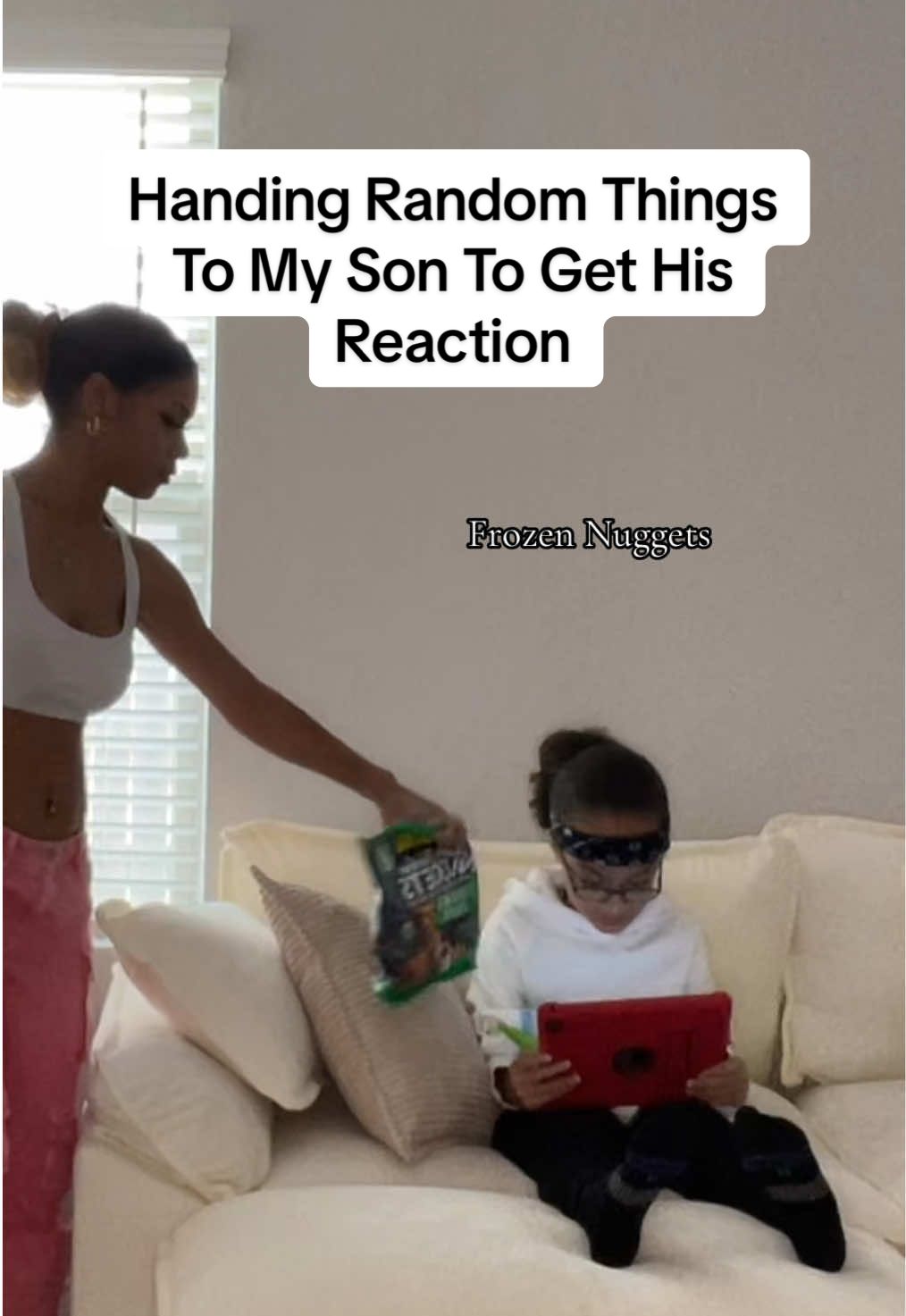 A post by @kassieemariee on TikTok caption: Handing Random Things To My Son To Get His Reaction…Snapchat kassiejuju3 #kassiemarie 