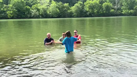 A post by @zerotothree_ on TikTok caption: #baptism #family #riverbaptism 