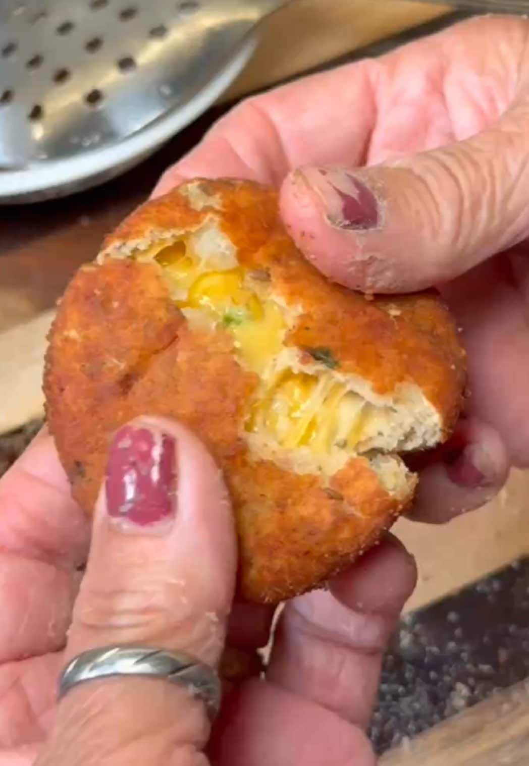 A post by @parmskitchen on TikTok caption: Cheese Aloo Tikki??  Ingredients: Potato  Salt  Pepper  Jeera  Onion Ginger Cilantro Cheese  Love  Corn Starch  Besan Bread Crumbs  Oil 
