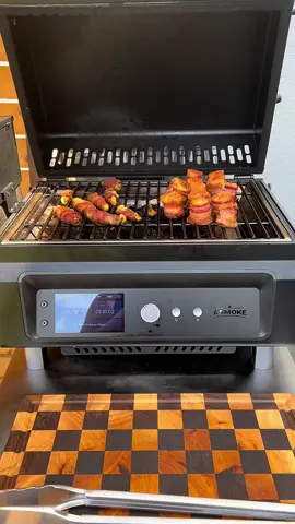 A post by @bbqdad1985 on TikTok caption: 🔥 Smoked to perfection! Aus dem A-Smoke Essential: Jalapeño Poppers, Pig Shots & Finger Food vom Feinsten – würzig, rauchig, unwiderstehlich! 💨🥓🌶️                          #BBQDAD#ASmokeEssential #FingerfoodDeluxe #JalapenoPoppers #PigShots