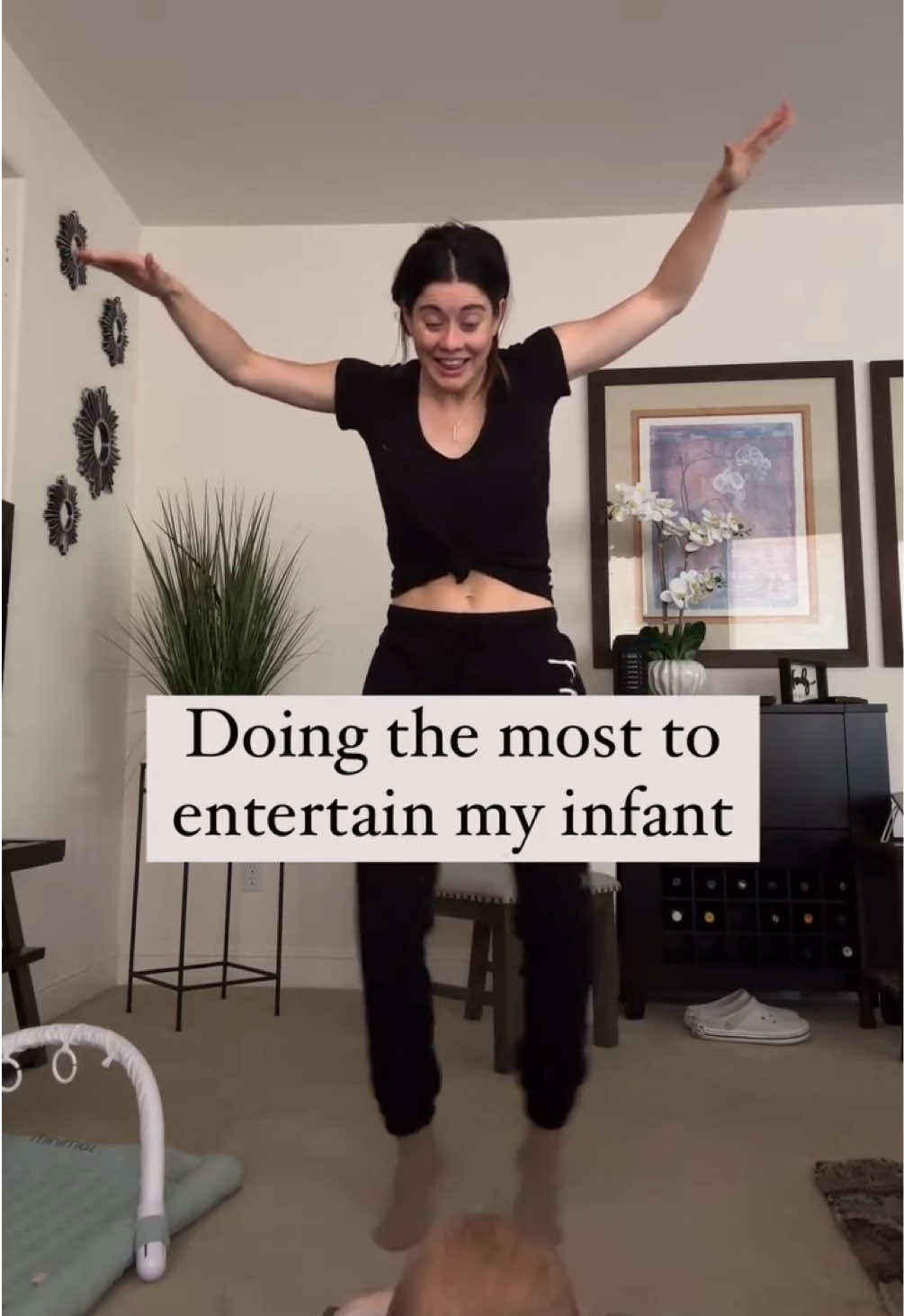A post by @manonmathews on TikTok caption: He loves it I swear....... #motherhood #baby #comedy #doingthemost