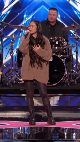 A post by @agt on TikTok caption: Season 1 alum Jessica Sanchez returns to the AGT stage with a Golden Buzzer worthy audition!  🌟 #AGT | @NBC and Peacock