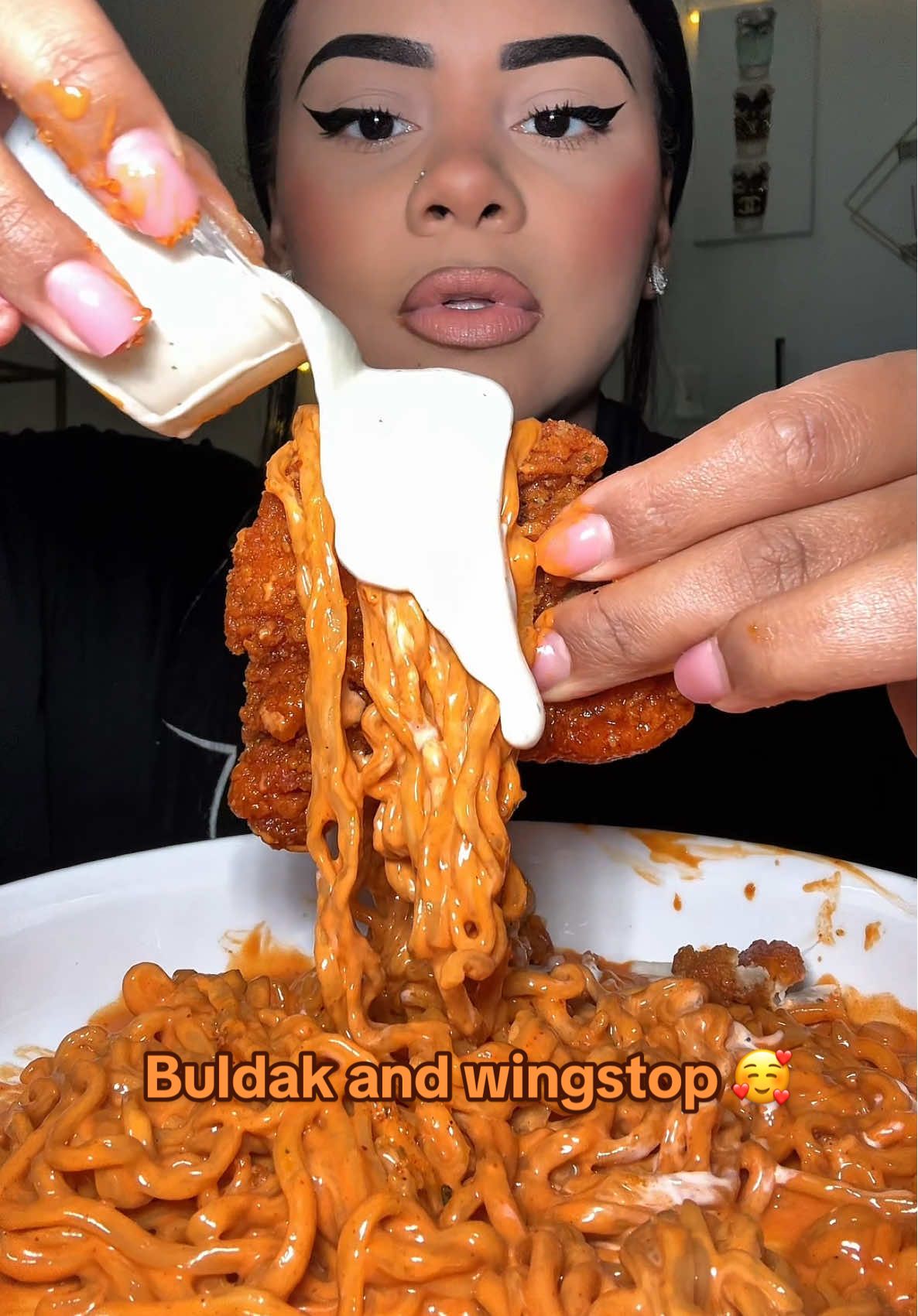 A post by @aliviadonai on TikTok caption: That 3rd tender was a whole patty I think 😂 idk it was still good. Hope yall have a blessed day! Love yall sm!!! God is amazing! Amen! 🙏  #buldak #buldakandwingstop #wingstop #fyp #viralvideo 