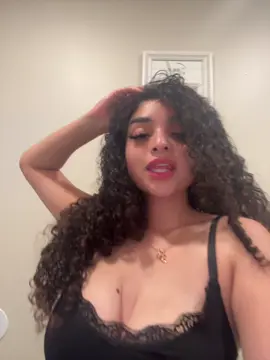 A post by @ on TikTok caption: 🙂‍↕️🖤 #fypシ #curlygirly #feelingirl #feelingirlbodysuit 