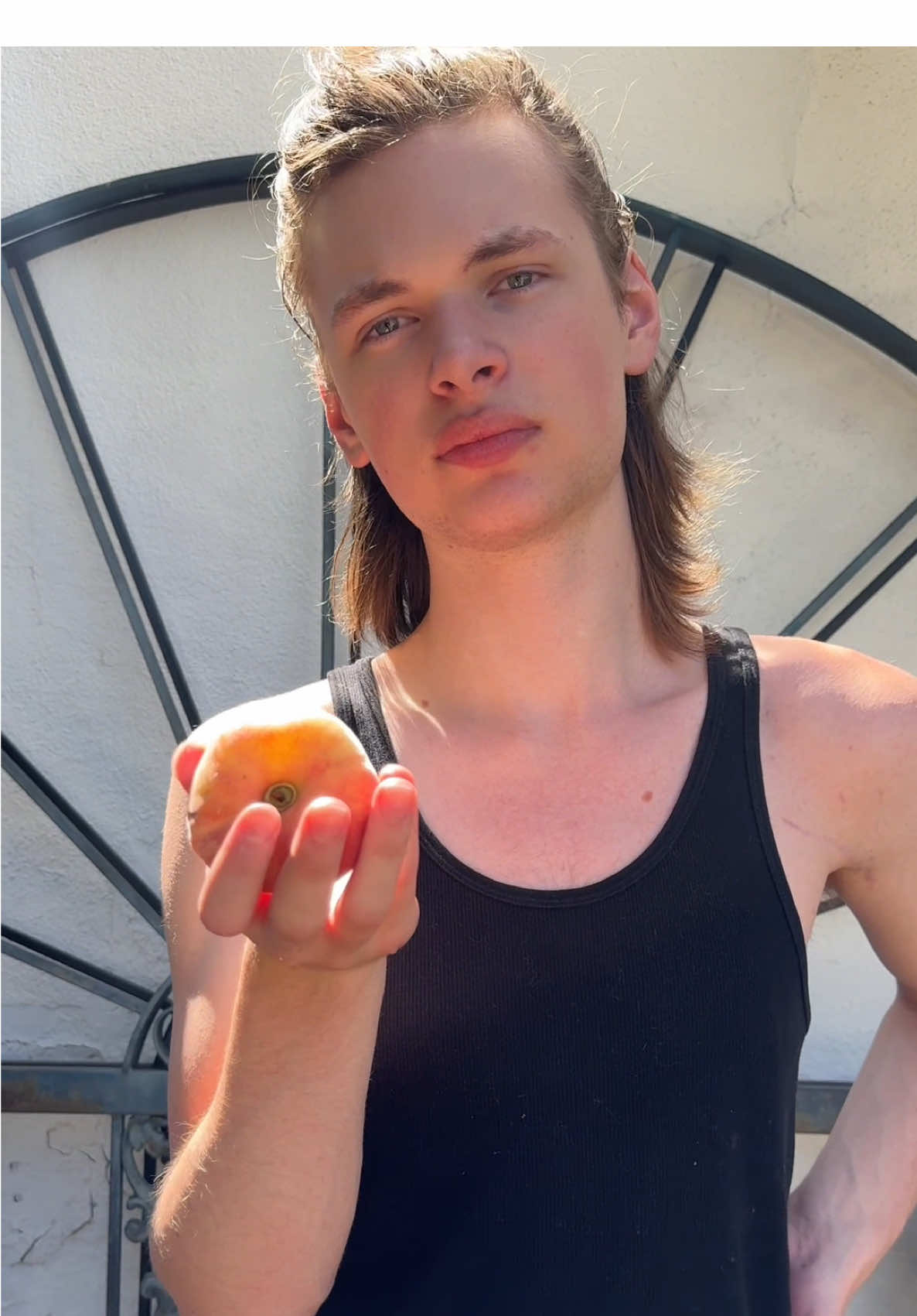 A post by @toren_wolf on TikTok caption: I will try a peach again! 😊💜💜💜 This is very good because fruits and vegetables are very difficult for me. A lovely gentleman at the farmers market gave it to me. Do you like peaches? ❤️ #autism #adhd #peach #arfidawareness 
