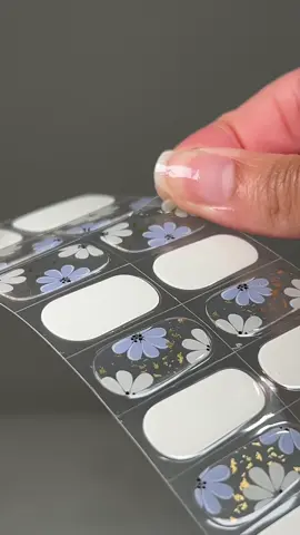 A post by @galorase on TikTok caption: Our gel nail strips simplify the process of doing your nails. Just stick them on and cure! 💅 It saves you money and a trip to the salon ⏰ ✨ Easy to apply & remove ✨ Lasts 2-3 weeks ✨ Odorless ✨ Non-damaging ✨ Semi-cured gel nail strips ✨ Affordable Get your own gel strips by going to the lenk in BlOO 🥰 Before they sell out again!  #gelnailsathome #gelnails #summernails #gelnailsticker #usa 