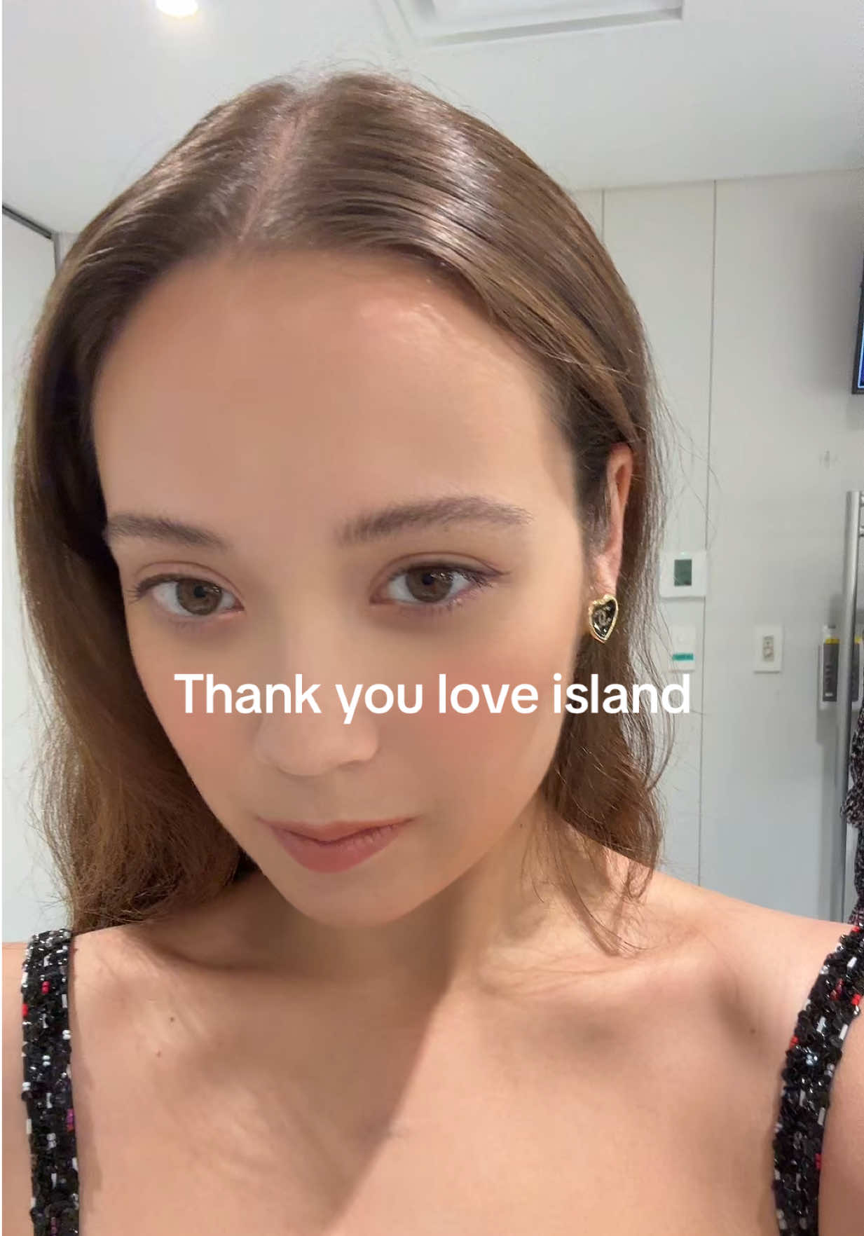 A post by @laufey on TikTok caption: congrats amaya and bryan ♥️