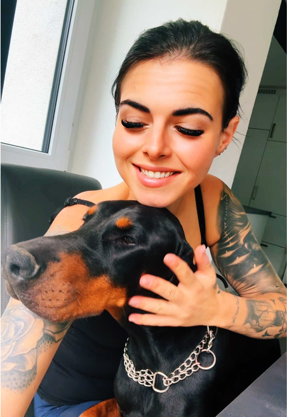 A post by @niinisworld on TikTok caption: #teamniinisworld♥️ #dobermann 