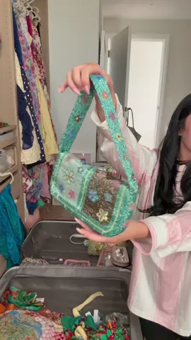 A post by @cinziazullo on TikTok caption: pack with me 💕🩷🗺️🌊🍓 my case got lost for 24 hours but I got it back🥹🥹🥹