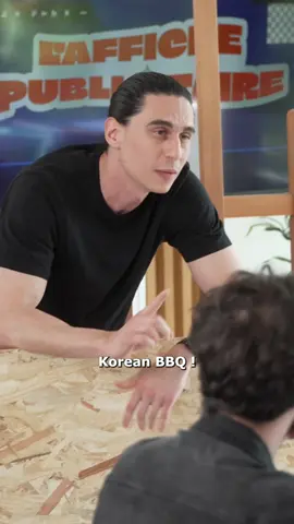 A post by @batzair on TikTok caption: J’ai présenté mon affiche à des gens… Je sais pas s’ils ont compris 😐  Allez voter pour ma saveur Korean BBQ de la gamme Vico Street Food dans ma dernière vidéo Youtube !