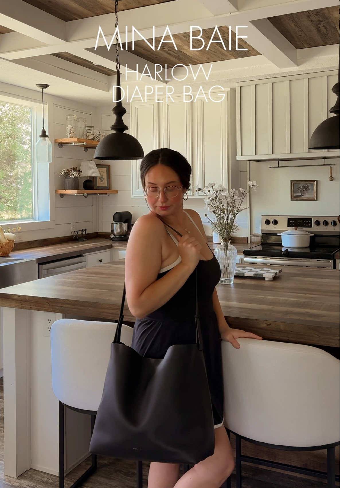 A post by @ on TikTok caption: The best diaper bag is back in stock! Harlow by @MINA BAIE 🤍👜#minabaie #ad 