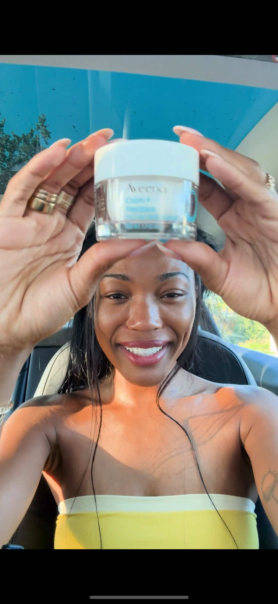 A post by @quenblackwell on TikTok caption: #AveenoPartner on the go skincare keeps my skin happy 🧚‍♂️ @Aveeno Buy on Amazon & ship to an Amazon Locker near you!