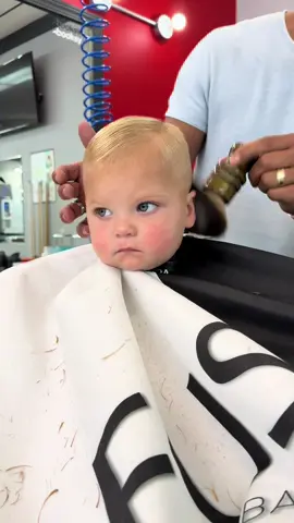 A post by @shawtgal49 on TikTok caption: 1 year old but asking for “the usual” and a hot towel #fyp #sahm #firsthaircut 